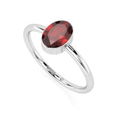 red garnet oval cut stackable bezel-set ring