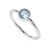sky blue topaz round cut stackable bezel-set ring