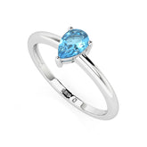 swiss blue topaz pear cut stackable prong-set ring