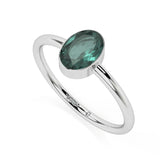 green tourmaline oval cut stackable bezel-set ring