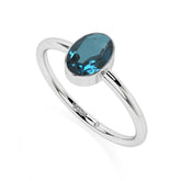 london blue topaz oval cut stackable bezel-set ring
