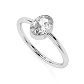 white topaz oval cut stackable bezel-set ring