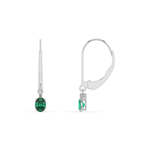 lab grown emerald oval dangle earrings with moissanite 