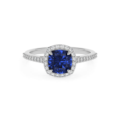 lab-grown blue-sapphire cushion half eterity halo solitaire engagement ring