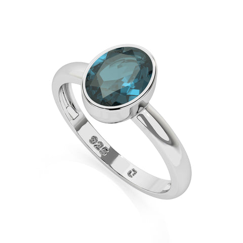 london blue topaz oval cut stackable bezel-set ring