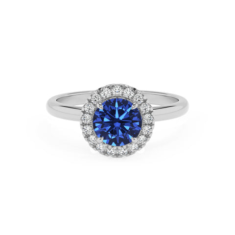 lab-grown blue-sapphire round halo solitaire engagement ring