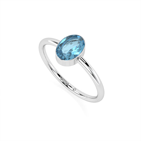 swiss blue topaz oval cut stackable bezel-set ring