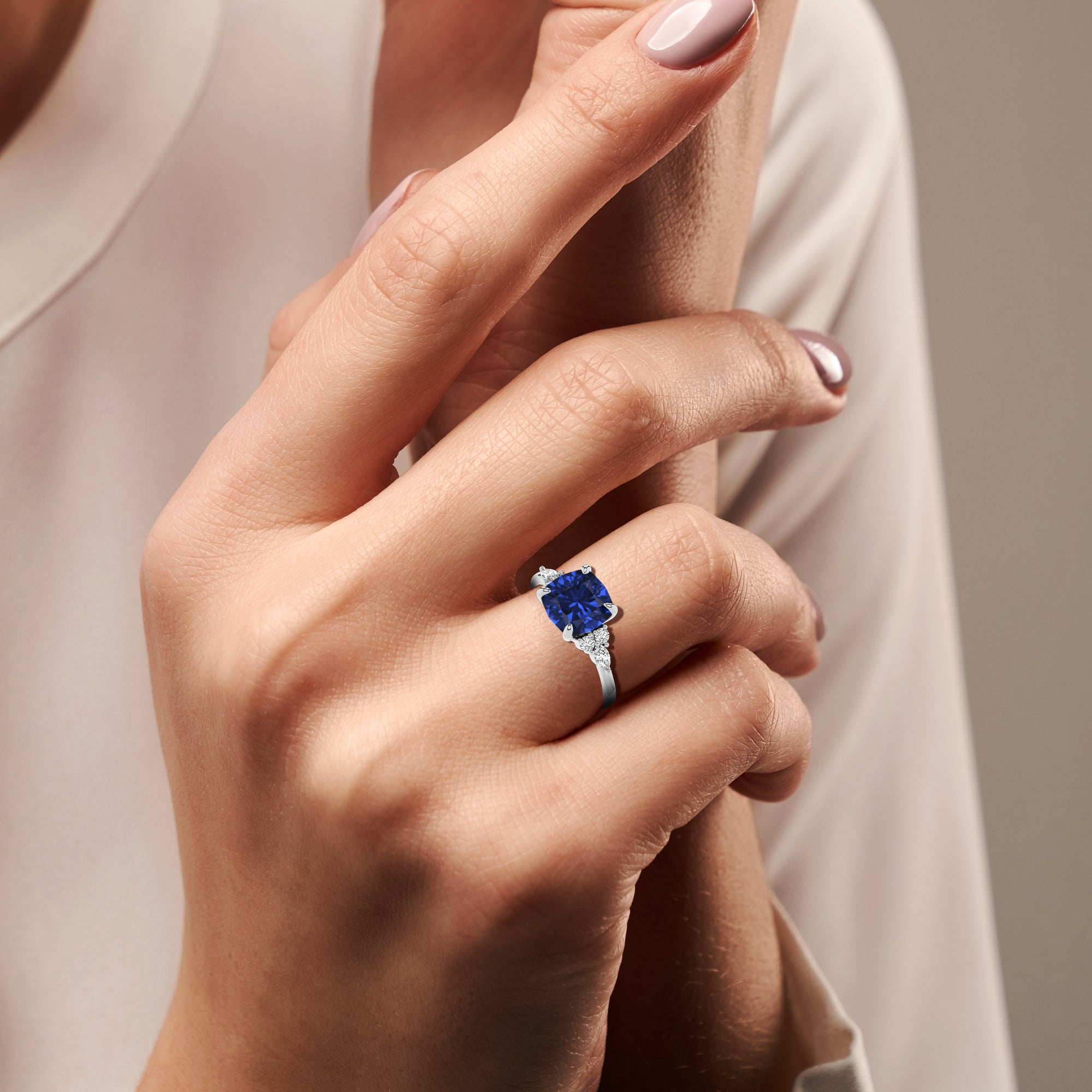 lab-grown blue-sapphire cushion solitaire engagement ring