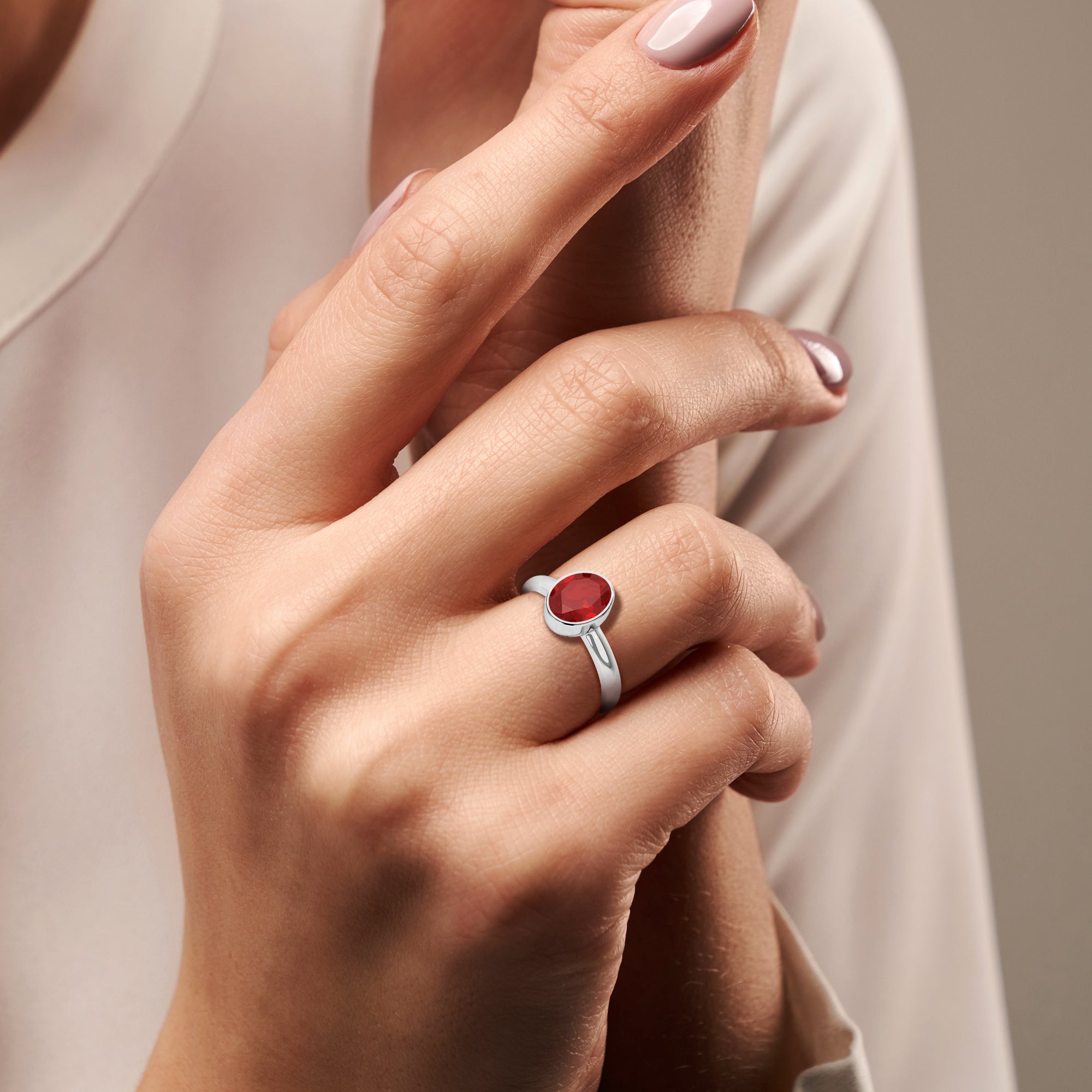 red garnet oval cut stackable bezel-set ring