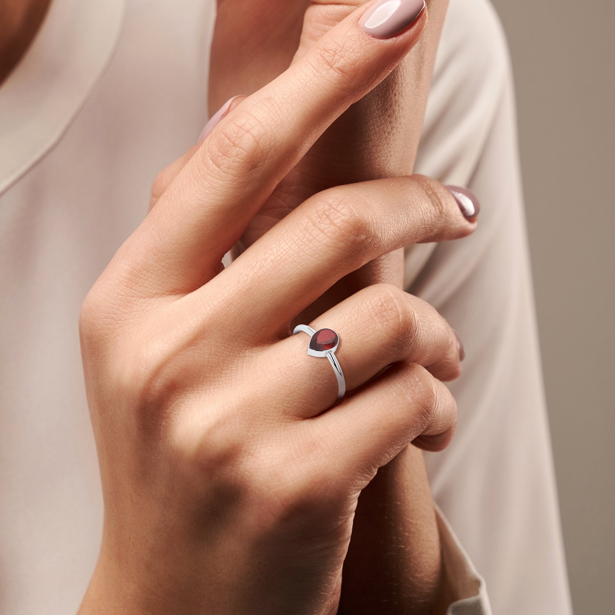 red garnet pear cut stackable bezel-set ring