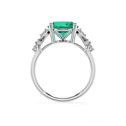 lab-grown emerald round criss cross solitaire engagement ring