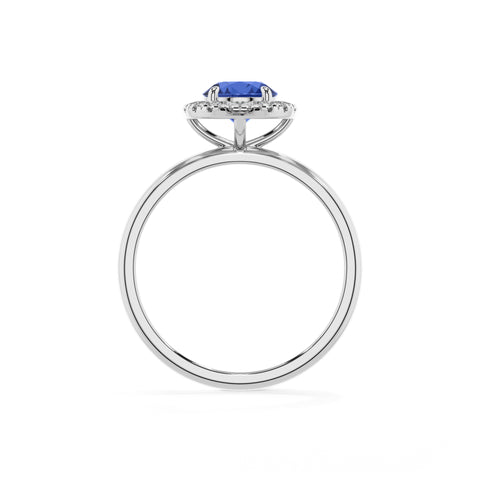 lab-grown blue-sapphire round halo solitaire engagement ring