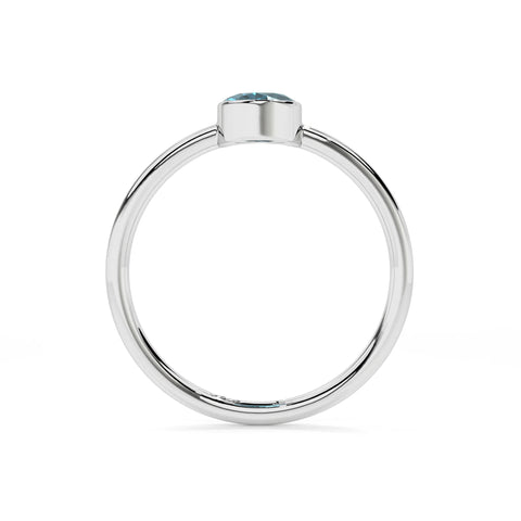 london blue topaz oval cut stackable bezel-set ring