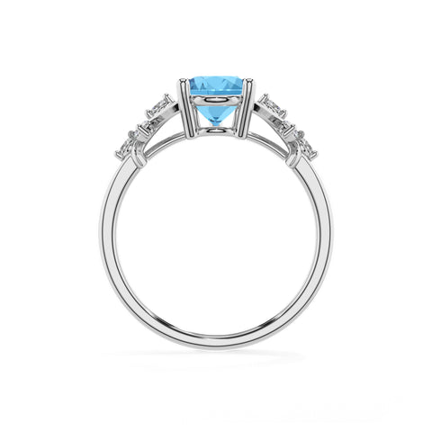 natural swiss blue topaz pear criss cross solitaire engagement ring