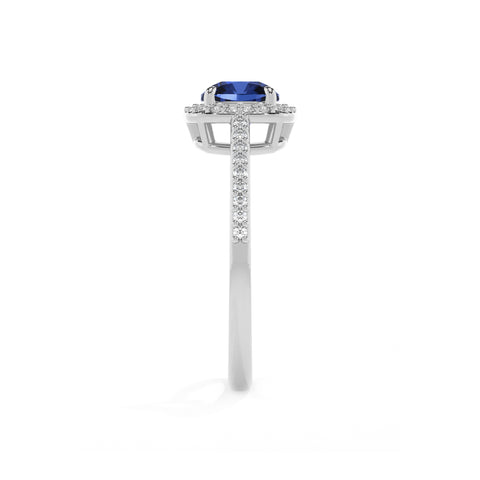 lab-grown blue-sapphire cushion half eterity halo solitaire engagement ring