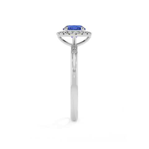 lab-grown blue-sapphire round halo solitaire engagement ring