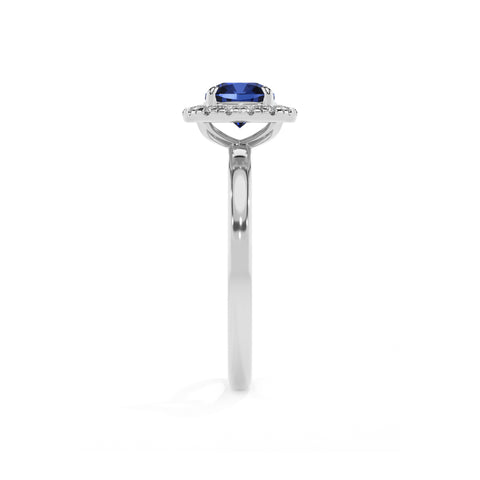 lab-grown blue-sapphire cushion halo solitaire engagement ring