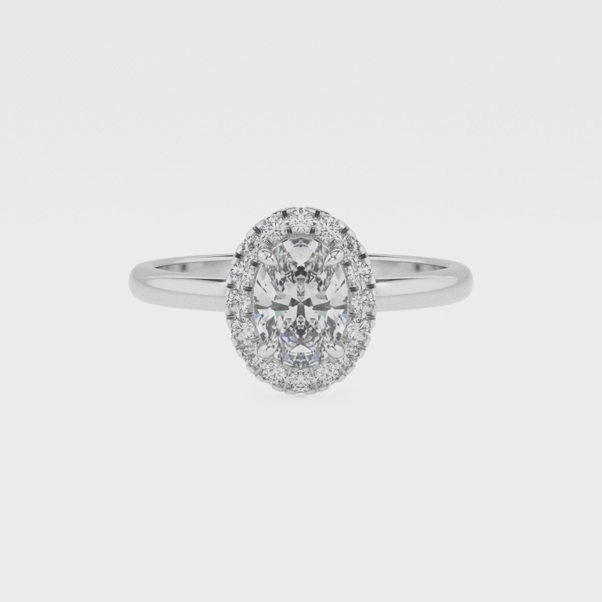 lab-grown emerald oval halo solitaire engagement ring